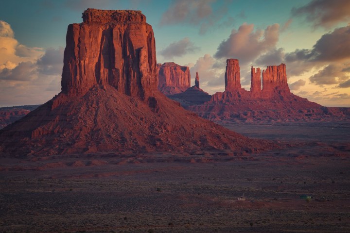 a canyon with a sunset in the background